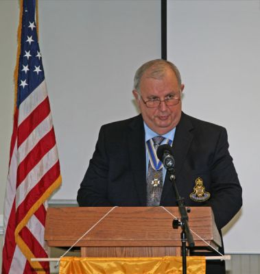 Chapter Vice President Rick Reese presentsCol. Nepute with the SAR Speaker's Appreciation certificate.