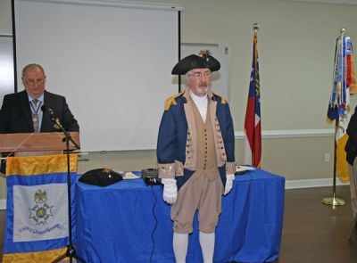 Chapter Vice President Rick Reese presentsCol. Nepute with the SAR Speaker's Appreciation certificate.