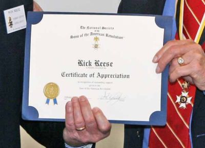 Rick Reese is given a Certificate of Appreciation by Past President Bob Shaw
